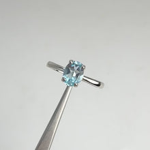 Load and play video in Gallery viewer, 6 x 8 mm. Oval Cut Sky Blue Brazilian Topaz Ring
