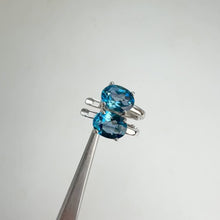 Load and play video in Gallery viewer, 6 x 8 mm. Oval Cut London Blue Brazilian Topaz Earrings
