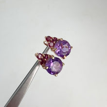 Load and play video in Gallery viewer, 9 mm. Round Cut Purple Brazilian Amethyst with Rhodolite Garnet Accents Earrings
