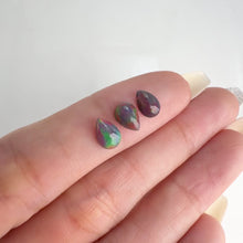 Load and play video in Gallery viewer, Lot of 3 5 x 7 mm. Pear Cabochon Black Ethiopian Opal
