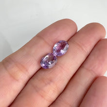 Load and play video in Gallery viewer, Pair of 7 x 9 mm. Oval Cut Purple Brazilian Amethyst
