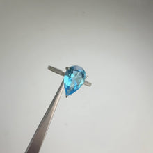 Load and play video in Gallery viewer, 8 x 12 mm. Pear Cut Swiss Blue Brazilian Topaz with Cz Accents Ring
