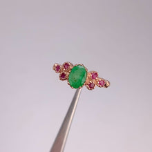 Load and play video in Gallery viewer, 5 x 7 mm. Oval Cut Green Brazilian Emerald with Ruby Accents Ring (Blemished)
