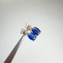 Load and play video in Gallery viewer, 6 x 8 mm. Oval Cut Blue Nepalese Kyanite with Cz Accents Earrings (Blemished)
