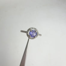 Load and play video in Gallery viewer, 6 mm. Round Cut Blue Violet Tanzanite with Cz Halo Ring
