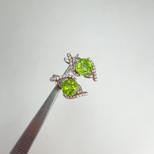 Load and play video in Gallery viewer, 7 mm. Round Cut Green Pakistani Peridot with Cz Accents Earrings
