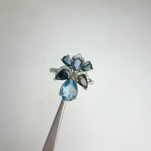 Load and play video in Gallery viewer, 6 x 8 mm. Pear Cut Sky Blue Brazilian Topaz and Sapphire Cluster Ring
