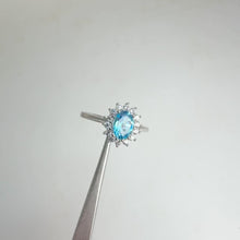 Load and play video in Gallery viewer, 5 x 7 mm. Oval Cut Swiss Blue Brazilian Topaz with Cz Accents Ring
