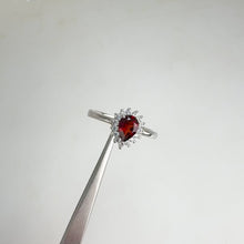 Load and play video in Gallery viewer, 5 x 7 mm. Pear Cut Red Mozambican Garnet Cz Accents Ring
