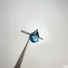 Load and play video in Gallery viewer, 7 x 9 mm. Pear Cut London Blue Brazilian Topaz Ring
