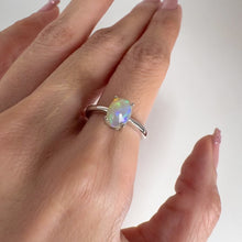 Load and play video in Gallery viewer, 6 x 8 mm. Oval Cabochon Multi-coloured Ethiopian Opal Ring
