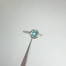Load and play video in Gallery viewer, 7 mm. Round Cut Sky Blue Brazilian Topaz Ring
