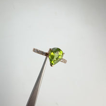 Load and play video in Gallery viewer, 7 x 9 mm. Pear Cut Green Pakistani Peridot with Cz Accents Ring
