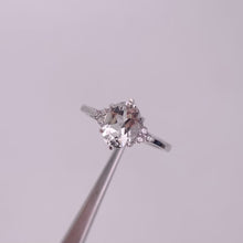 Load and play video in Gallery viewer, 6 x 8 mm. Oval Cut White Brazilian Topaz with Cz Accents Ring

