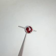 Load and play video in Gallery viewer, 6 mm. Round Cut Red Mozambican Garnet with Cz Halo Ring

