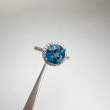 Load and play video in Gallery viewer, 8 mm. Round Cut London Blue Brazilian Topaz with Cz Halo Ring
