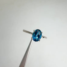 Load and play video in Gallery viewer, 6 x 8 mm. Oval Cut London Blue Brazilian Topaz Ring
