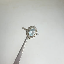 Load and play video in Gallery viewer, 5 x 7 mm. Oval Cut Blue Brazilian Aquamarine with Cz Accents Ring

