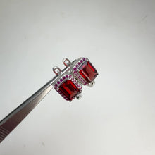 Load and play video in Gallery viewer, 6 x 8 mm. Octagon Cut Red African Garnet with Ruby Halo Earrings
