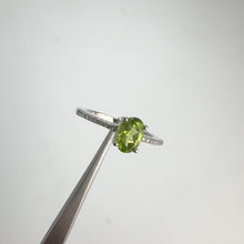 Load and play video in Gallery viewer, 5 x 7 mm. Oval Cut Green Pakistani Peridot with Cz Band Ring
