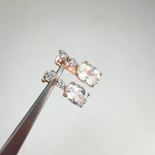 Load and play video in Gallery viewer, 6 x 8 mm. Oval Cut White Brazilian Topaz with Cz Accents Earrings
