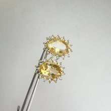 Load and play video in Gallery viewer, 10 x 14 mm. Oval Cut Yellow Brazilian Citrine with Topaz Accents Earrings
