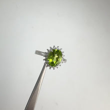 Load and play video in Gallery viewer, 7 x 9 mm. Oval Cut Green Pakistani Peridot with Cz Accents Ring
