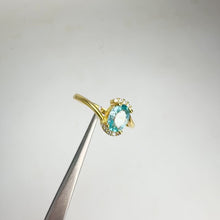 Load and play video in Gallery viewer, 5 x 7 mm. Oval Cut Blue Cambodian Zircon with Cz Accents Ring

