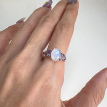 Load and play video in Gallery viewer, 7 x 9 mm. Oval Cabochon White Indian Moonstone and Amethyst Trilogy Ring
