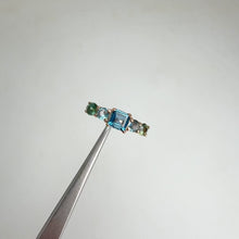 Load and play video in Gallery viewer, 4. 5 mm. Square Cut London Blue Brazilian Topaz and Sapphire Cluster Ring
