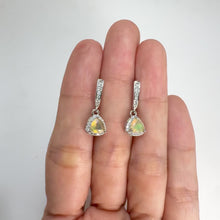 Load and play video in Gallery viewer, 5 mm. Trillion Cut Multi-coloured Ethiopian Opal with Cz Halo Drop Earrings
