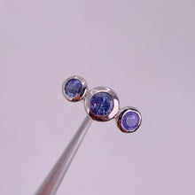 Load and play video in Gallery viewer, 5 mm. Round Cut Blue Violet Tanzanite Trilogy Ring
