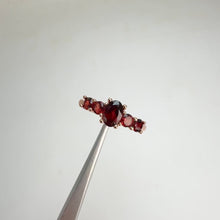 Load and play video in Gallery viewer, 4 x 6 mm. Oval Cut Red African Garnet Cluster Ring
