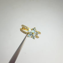 Load and play video in Gallery viewer, 3 x 4 mm. Pear Cut Sky Blue Brazilian Topaz with Cz Accents Cluster Ring
