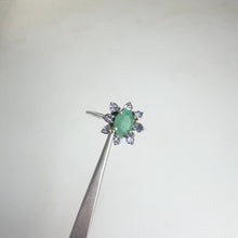 Load and play video in Gallery viewer, 5 x 7 mm. Oval Cut Green Brazilian Emerald and Tanzanite Cluster Ring (Blemished)

