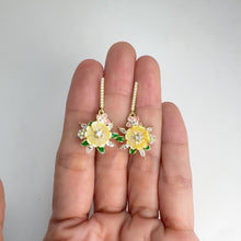 Load and play video in Gallery viewer, 10 mm. Carved Yellow Mother of Pearl with Cz Accents Drop Earrings
