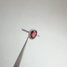 Load and play video in Gallery viewer, 5 x 7 mm. Oval Cut Red African Garnet with Cz Halo Ring
