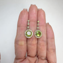 Load and play video in Gallery viewer, 7 mm. Round Cut Green Pakistani Peridot with Sapphire Accents Drop Earrings
