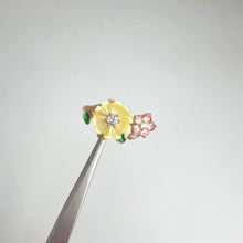 Load and play video in Gallery viewer, 10 mm. Carved Yellow Mother of Pearl with Cz Accents Open Ring

