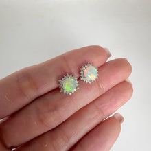 Load and play video in Gallery viewer, 6 mm. Hexagon Cut Multi-coloured Ethiopian Opal with Cz Accents Earrings
