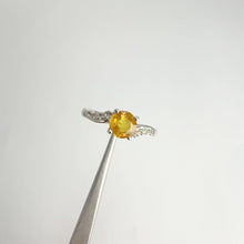 Load and play video in Gallery viewer, 6 mm. Round Cut Yellow Thai Sapphire with Cz Accents Ring
