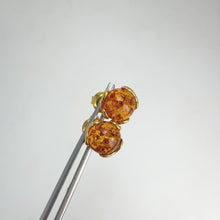 Load and play video in Gallery viewer, 8 mm. Round Cabochon Orange Polish Amber Earrings
