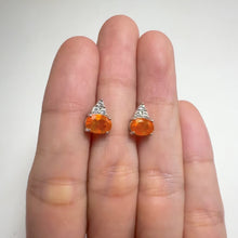 Load and play video in Gallery viewer, 5 x 7 mm. Oval Cut Orange Ethiopian Opal with Cz Accents Earrings
