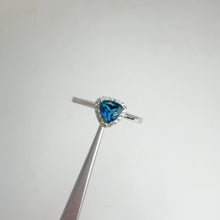 Load and play video in Gallery viewer, 5 mm. Trillion Cut London Blue Brazilian Topaz with Cz Halo Ring
