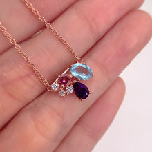 Load and play video in Gallery viewer, 5 x 7 mm. Oval Cut Sky Blue Brazilian Topaz, Amethyst and Tourmaline with Cz Accents Necklace
