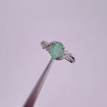 Load and play video in Gallery viewer, 6 x 8 mm. Oval Cut Green Zambian Emerald with Cz Accents Ring

