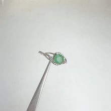 Load and play video in Gallery viewer, 5.5 mm. Round Cut Green Zambian Emerald with Cz Accents Ring
