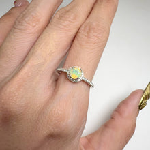 Load and play video in Gallery viewer, 5 mm. Round Cut Multi-coloured Ethiopian Opal with Cz Accents Ring
