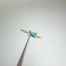 Load and play video in Gallery viewer, 4 x 6 mm Octagon Cut Blue Brazilian Aquamarine with Cz Band Ring
