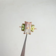 Load and play video in Gallery viewer, Handmade 5 x 10 mm. Octagon Cut Pink Bi-colour Nigerian Tourmaline and Peridot Trilogy Ring
